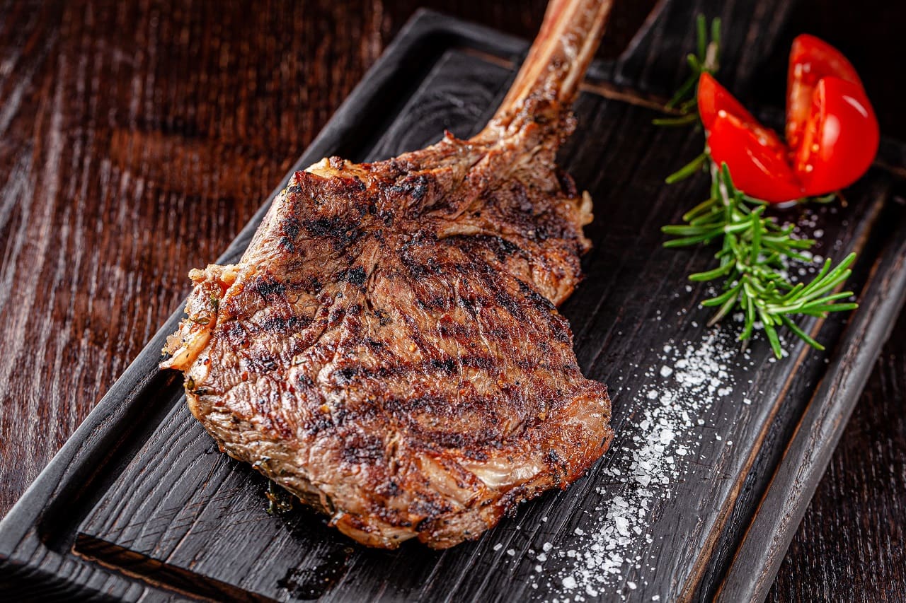 Large-juicy-grilled-steak-on-a-tomahawk-bone